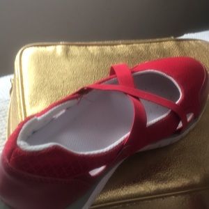 Red and white sole shoe
